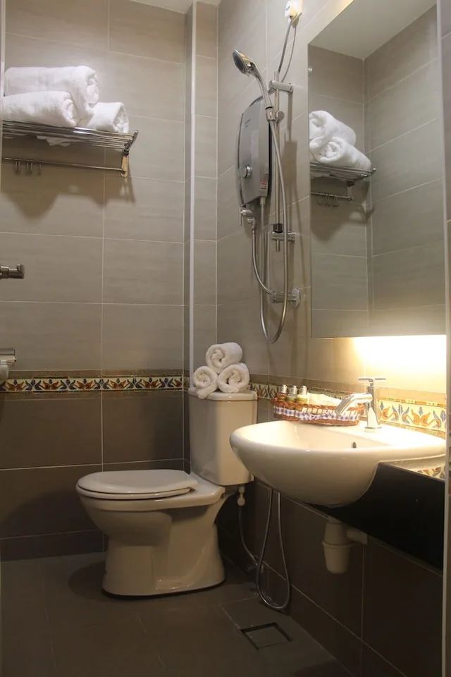 غرفة ديلوكس ثلاثية بسرير كوين وسرير فردي، Fomecs Boutique Hotel 3/4