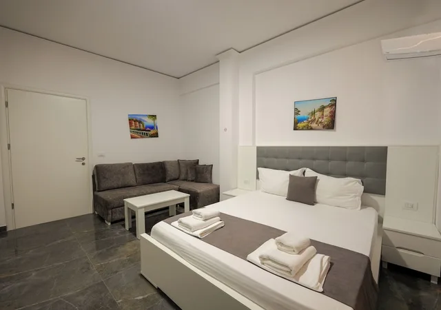 Room, Quadruple, Double Bed, Lateral Side Sea View, 2 Sofa، Vila Era Beach 1/4