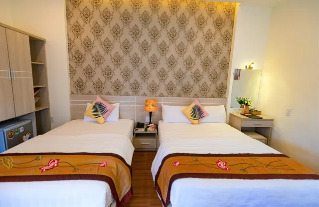 غرفة عائلية بسرير كينج وسرير فردي بإطلالة على الحديقة، Flora Hotel Hue 8/10