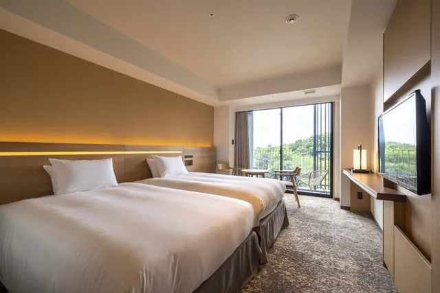 غرفة ركنية بسريرين منفصلين بإطلالة على الحديقة بشرفة بحوض استحمام، Umekoji Potel KYOTO 1/10