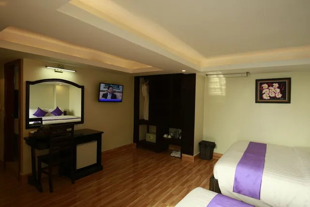 Deluxe, Triple, 1 King and 1 Single Beds, Chheng Residence 2/3