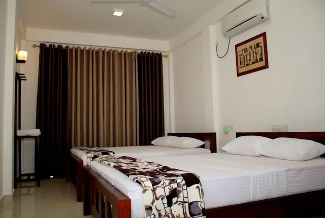 غرفة عائلية بسريرين كينج، Seasons Villa 4/8