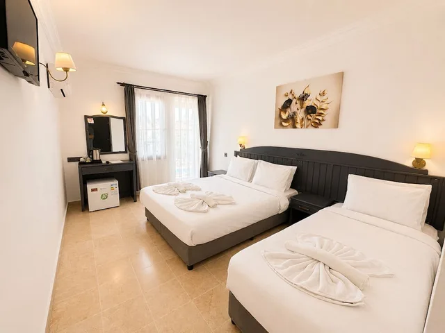 غرفة قياسية ثلاثية بسرير كوين وسرير فردي، Kilim Hotel 4/10
