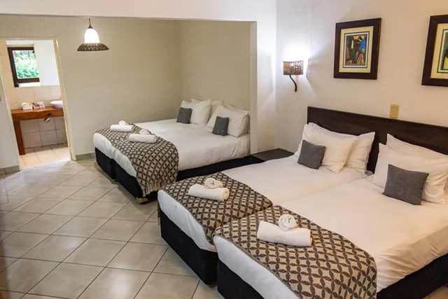 غرفة عائلية، Hotel Numbi and Garden Suites 1/5