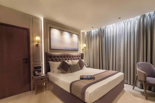 غرفة سيغنتشر بسرير كينج، Grand Residency Service Apartment 1/4