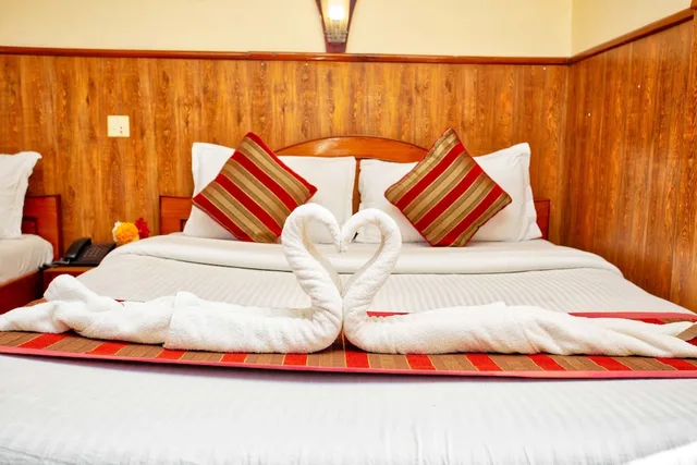 غرفة ديلوكس بسرير كوين، Hotel Grand Holiday 2/5