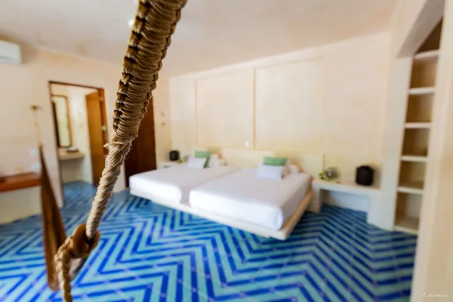 غرفة ديلوكس بسريرين كوين، Hotel Holistika 3/5