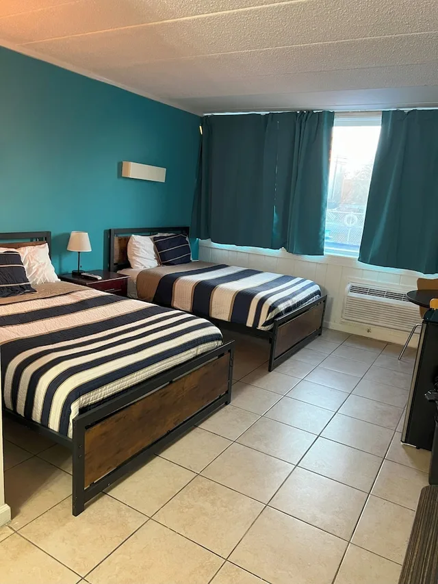 جناح بريميوم بسرير كوين وسريرين مزدوجين بغرفتي نوم بحمام خاص، Aire Hotel North Beach 1/10