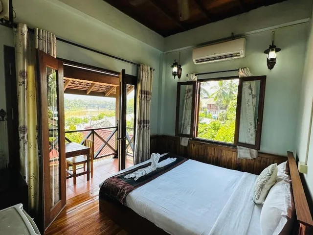غرفة ديلوكس بسرير كوين بإطلالة على النهر، Villa Kingkham Riverside 2/2