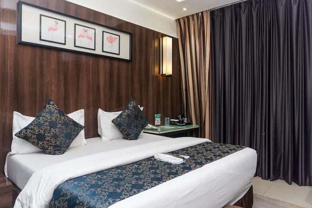 غرفة قياسية بسرير كوين، Green Point Hotel 1/3