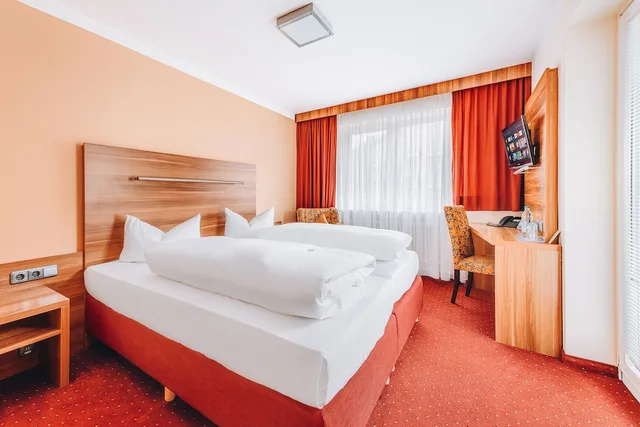 غرفة عائلية بسرير كينج وسرير فردي بشرفة، HOTEL ISARTOR 6/9