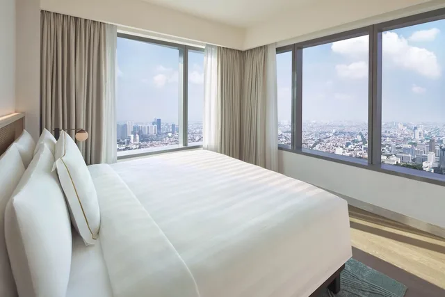 جناح ديلوكس بسرير كينج بغرفة نوم واحدة، PARKROYAL Serviced Suites Jakarta 1/4