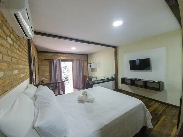 غرفة بريميوم بسرير كوين بإطلالة مع أريكة، Yannai Chalé Praia 2/10