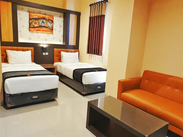 غرفة ديلوكس بسريرين منفصلين للمدخنين، HOTEL MUKTI JAYA 2/3