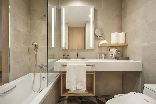 غرفة قياسية بسريرين منفصلين بحوض استحمام، MD Hotel Doksan 3/4