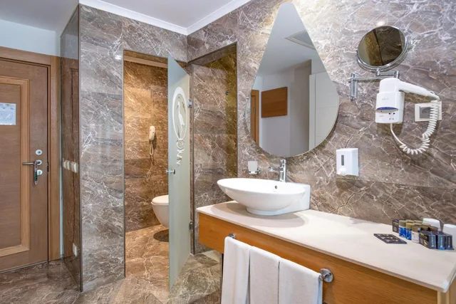 غرفة ثلاثية بإطلالة على البحر، Port Nature Luxury Resort Hotel and Spa 7/9