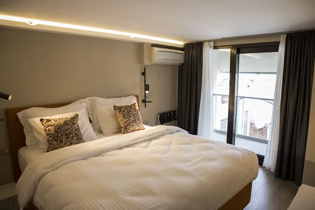 جناح عائلي بسريرين كينج وسريرين كوين بغرفتي نوم، Sparkle Hotel 3/10