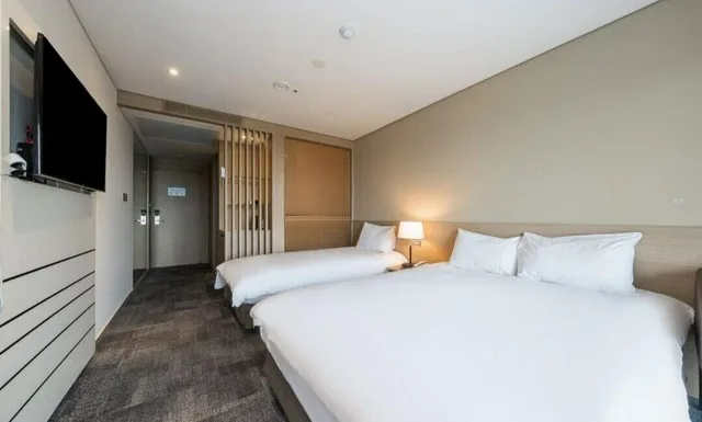غرفة عائلية بسريرين مزدوجين بإطلالة على المدينة، The Best Jeju Seongsan Hotel 2/9