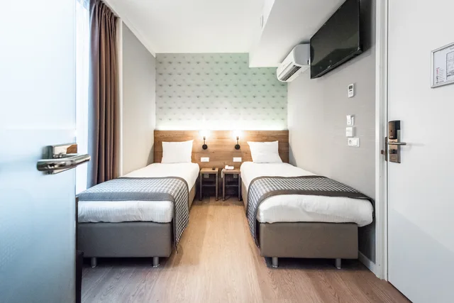 غرفة اقتصادية بسريرين منفصلين، Melrose Hotel 3/7