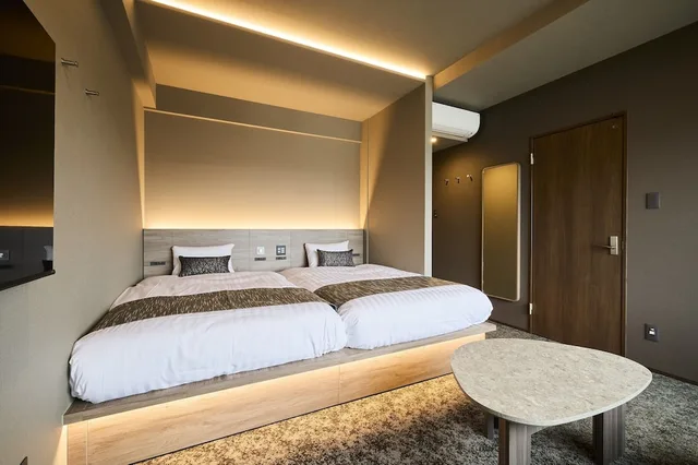 غرفة سوبيريور بفراش فوتون وسريرين منفصلين مع أريكة، Fav Hotel Kagoshima Chuo 1/2