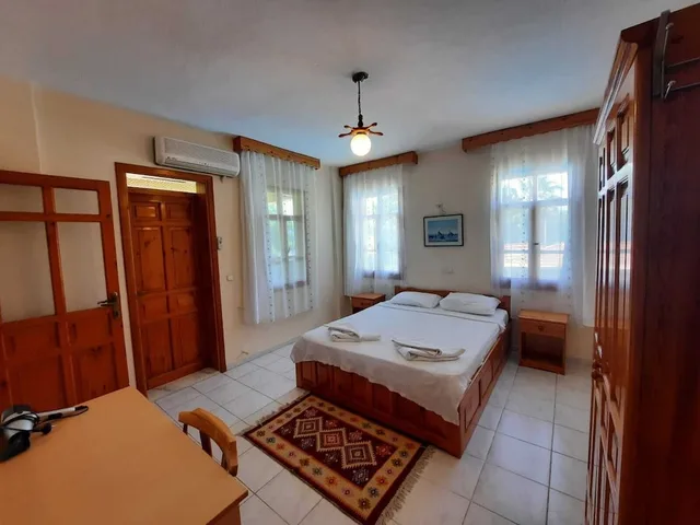 فيلا كومفورت بسرير كينج وسريرين منفصلين مع أريكة، Adilan Villas and Apartments 1/2