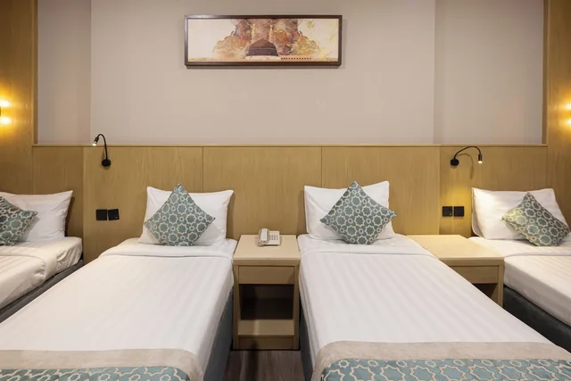 غرفة رباعية بأربعة أسرّة، فندق عفراء(Afraa Hotel) 1/8