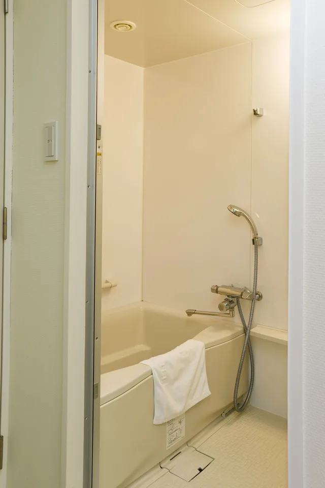غرفة بسرير كوين، J HOTEL Rinku 4/4