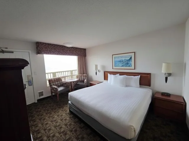 غرفة قياسية بسرير كينج بإطلالة على البحر، Seagrass Oceanfront Inn 8/10
