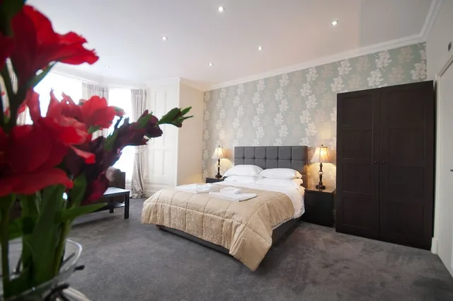 جناح تنفيذي بسرير مزدوج مع أريكة، Palmerston Suites 2/5