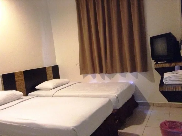 غرفة بسريرين منفصلين، Hotel Traveller 2/3