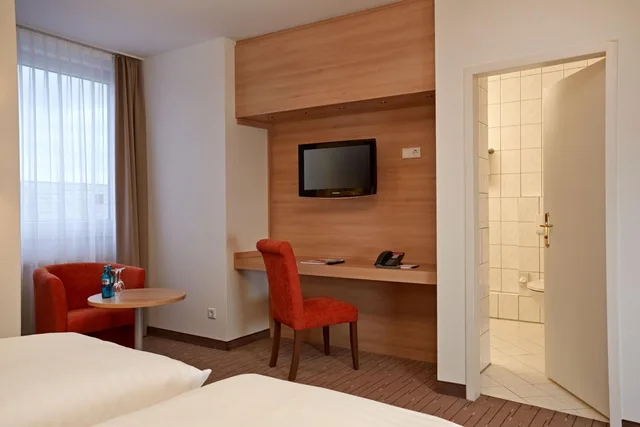 غرفة عائلية مع أريكة، H+ HOTEL WIESBADEN NIEDERNHAUSEN 5/9