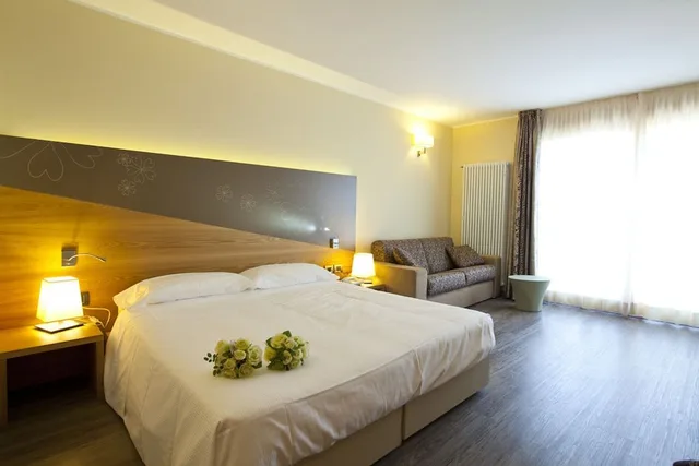 Suite, King Bed, Sofa, Harmony Suite Hotel 1/5