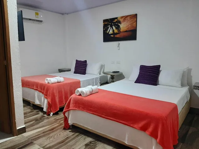 غرفة قياسية رباعية بسريرين مزدوجين بغرفة نوم واحدة، Hotel Sunset Beach 3/8