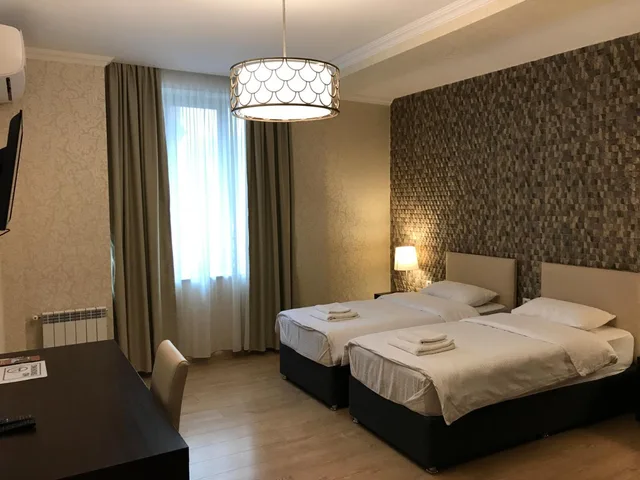 جناح عائلي بسرير كينج مع أريكة، Eleon Boutique Hotel 1/1