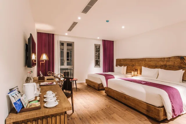 غرفة بريميوم ثلاثية بسرير كينج وسرير فردي، JM Boutique Hotel 1/4