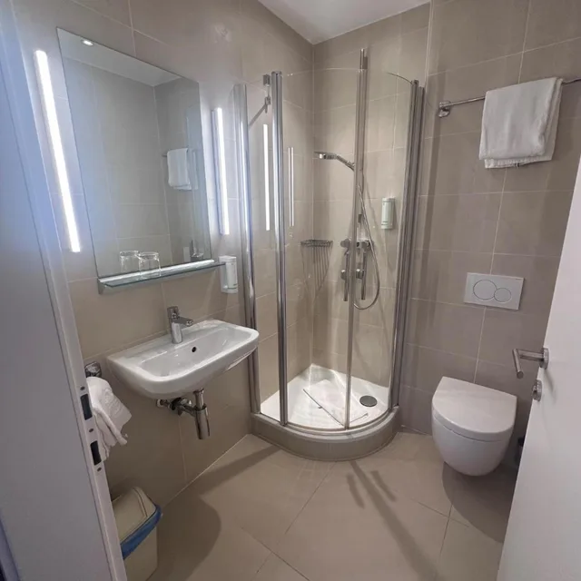 غرفة مفردة، Hotel Caroline 5/8