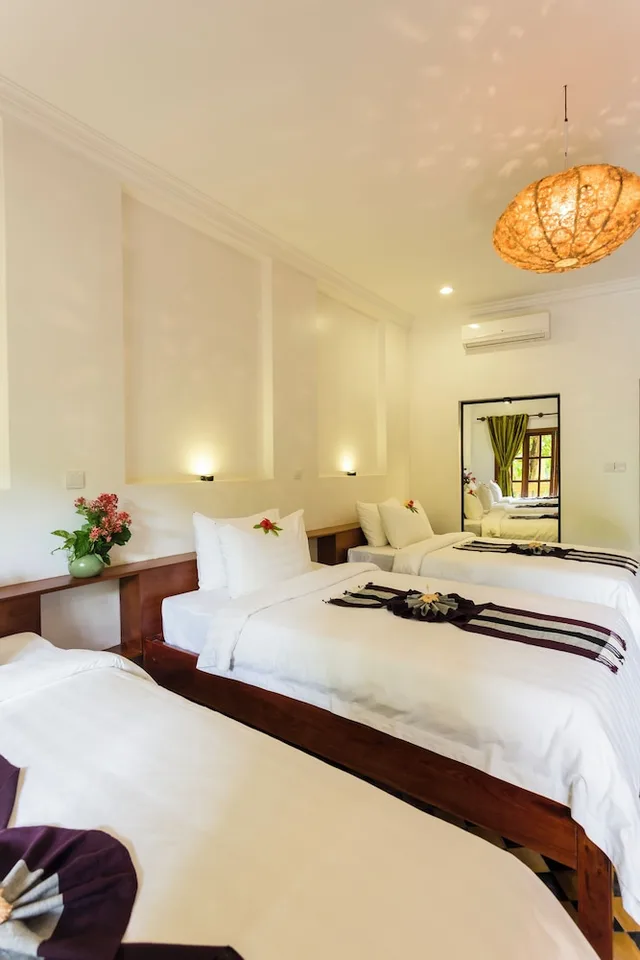 غرفة ديلوكس ثلاثية بثلاثة أسرّة بإطلالة على المسبح، Le Jardin d'Angkor Hotel 2/3
