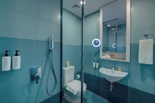 غرفة سيغنتشر بسرير كينج، Nest Hotel Aljada 4/4