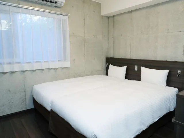 غرفة قياسية بسريرين منفصلين بغرفتي نوم، The Breakfast Hotel Marche Ishigakijima 5/7
