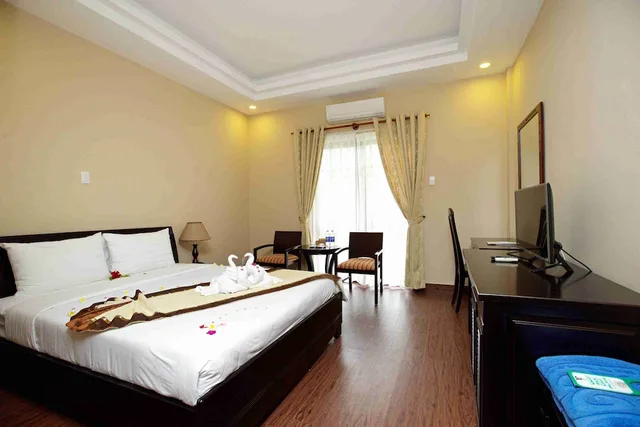 غرفة ديلوكس بسرير مزدوج بإطلالة على الحديقة، Blue Bay Mui Ne Resort Spa 3/3