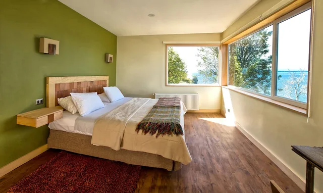 Economy, Cabin, Suite, King Bed, Sofa، Cabanas Del Lago 2/3