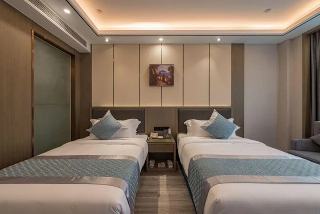Select, Twin Beds، Rezen Hotel Wansheng International 1/1