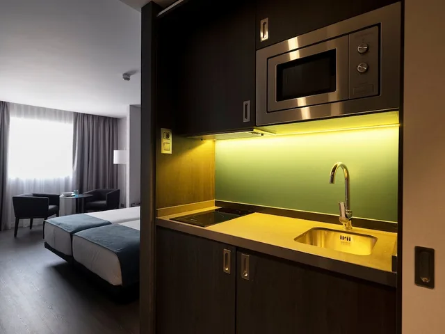 Superior, Triple, Double Bed, Sofa, Kitchen, HG City Suites Barcelona 1/2