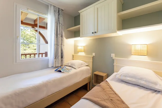شقة بسريرين منفصلين بغرفة نوم واحدة مع أريكة، Pierre Vacances Residence La Villa Maldagora 1/10