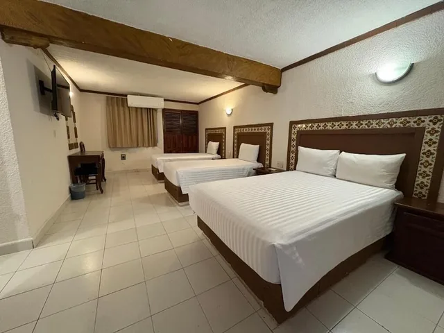 غرفة سوبيريور ثلاثية بسرير مزدوج وسريرين منفصلين، Suites Cancun Center 1/6