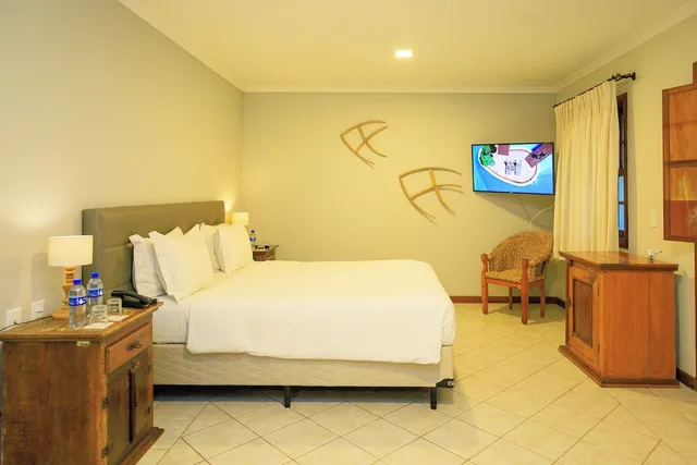 Room, Triple, 1 Double and 1 Single Bed, Sea Front, Main Building، Vila Angatu Eco Resort and Spa 1/6