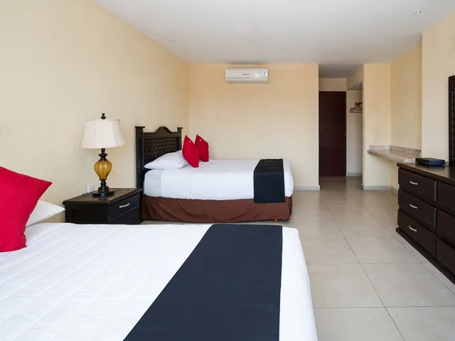 غرفة قياسية بسريرين مزدوجين، Capital O Hotel Los Caracoles 1/4