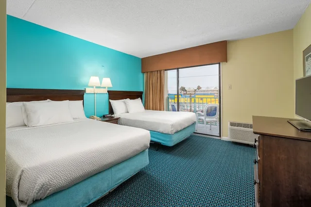 جناح بسريرين مزدوجين مع أريكة، Cayman Suites Hotel 2/6