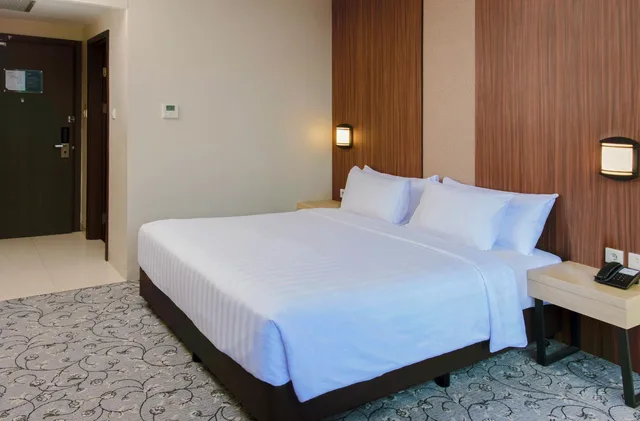 غرفة ديلوكس بسرير كينج، Aston Gorontalo Hotel & Convention Center 3/7