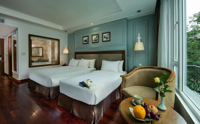 غرفة ديلوكس ثلاثية بسرير كوين وسرير فردي بإطلالة على المدينة، Hanoi Pearl Hotel 9/10